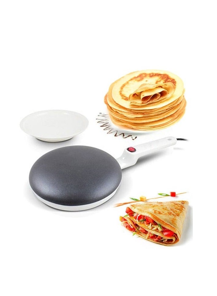 An electric device for making crepes or pancakes. It features a simple and lightweight design with a non-stick cooking surface that allows for easy and quick preparation of crepes. It is used by heating the surface and placing the mixture on it to make even and fluffy crepes. - Image 2